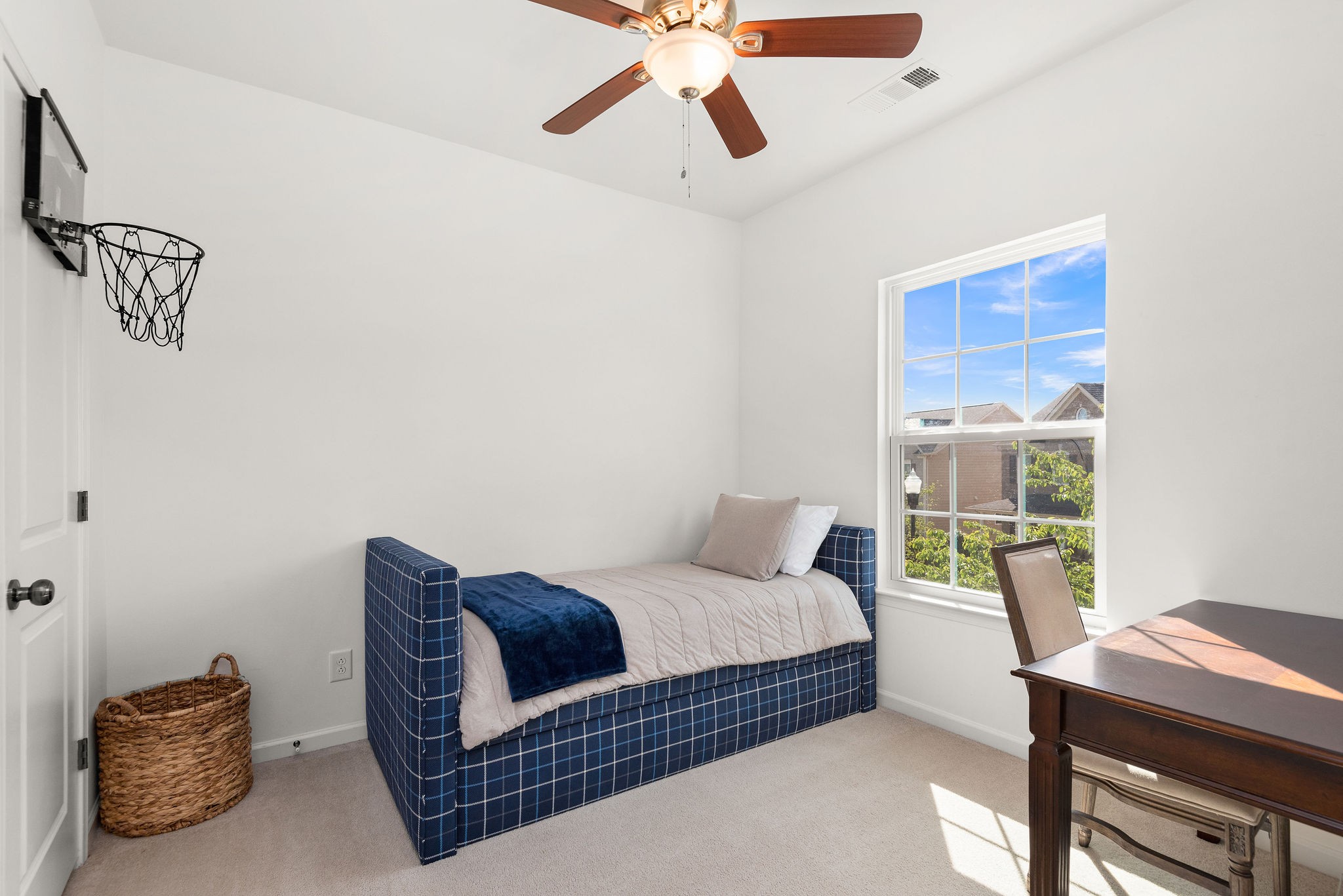 620 Streamside Lane Franklin, TN 37064 - Photo 32 of 45 a bedroom with a bed and a chandelier