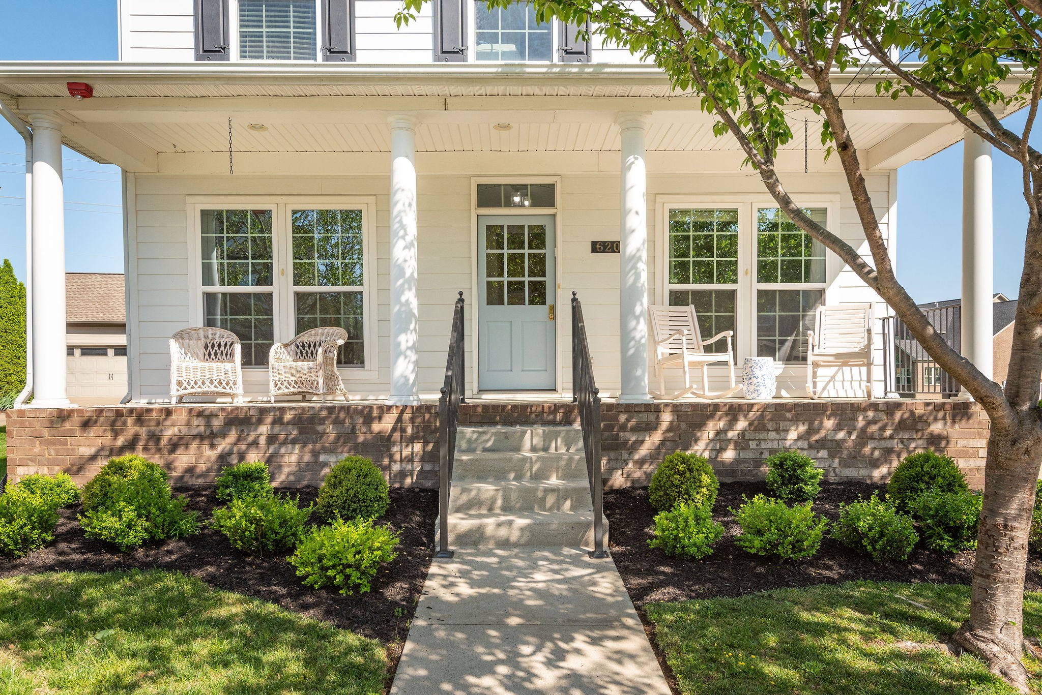 620 Streamside Lane Franklin, TN 37064 - Photo 4 of 45 a front view of a house with garden