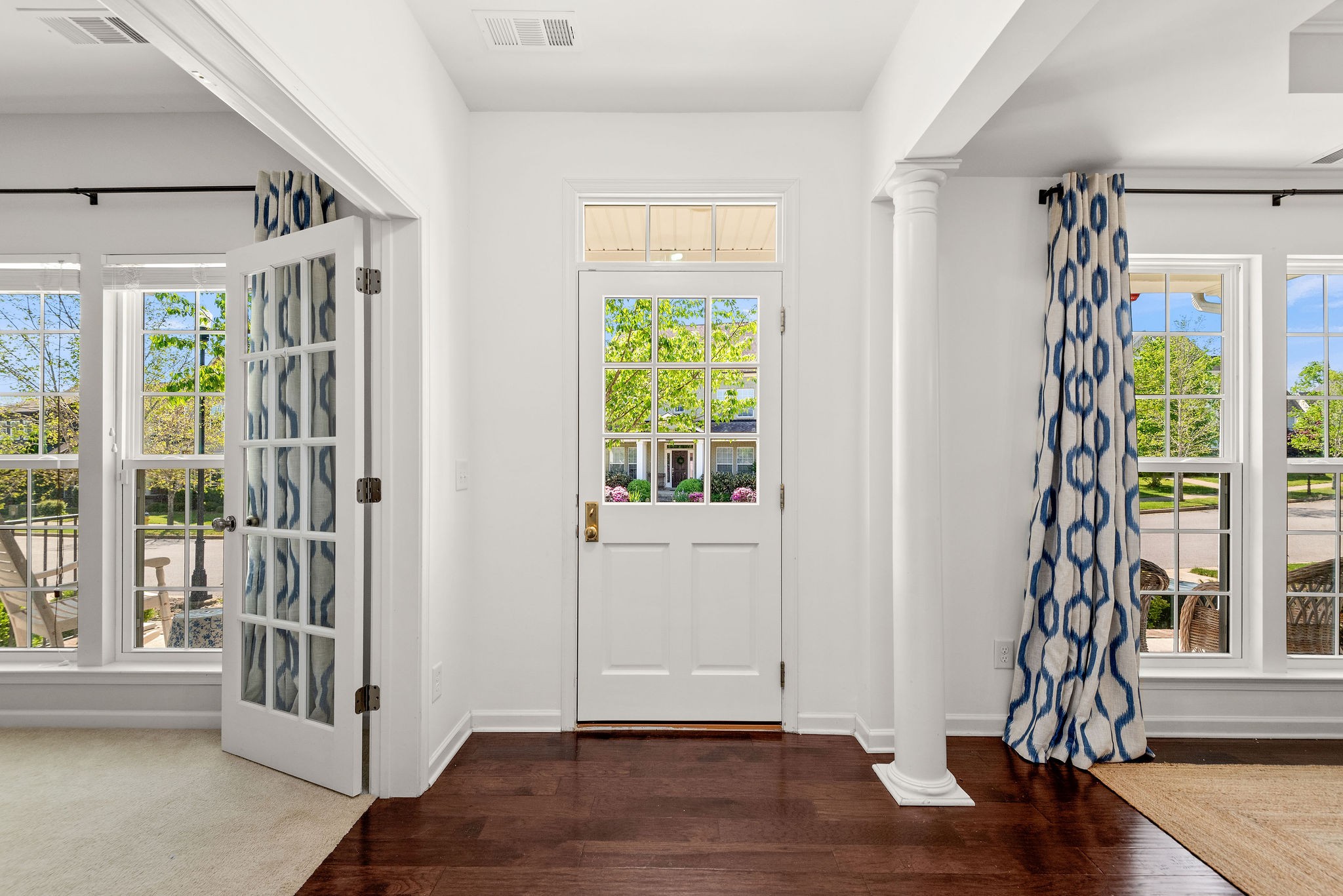620 Streamside Lane Franklin, TN 37064 - Photo 6 of 45 a view of entryway with wooden floor and front door