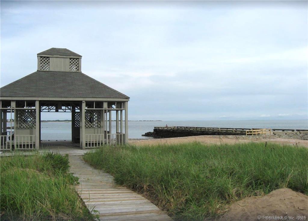 56 Island Avenue Madison, CT 06443 - Photo 22 of 25 a house with river in front of it