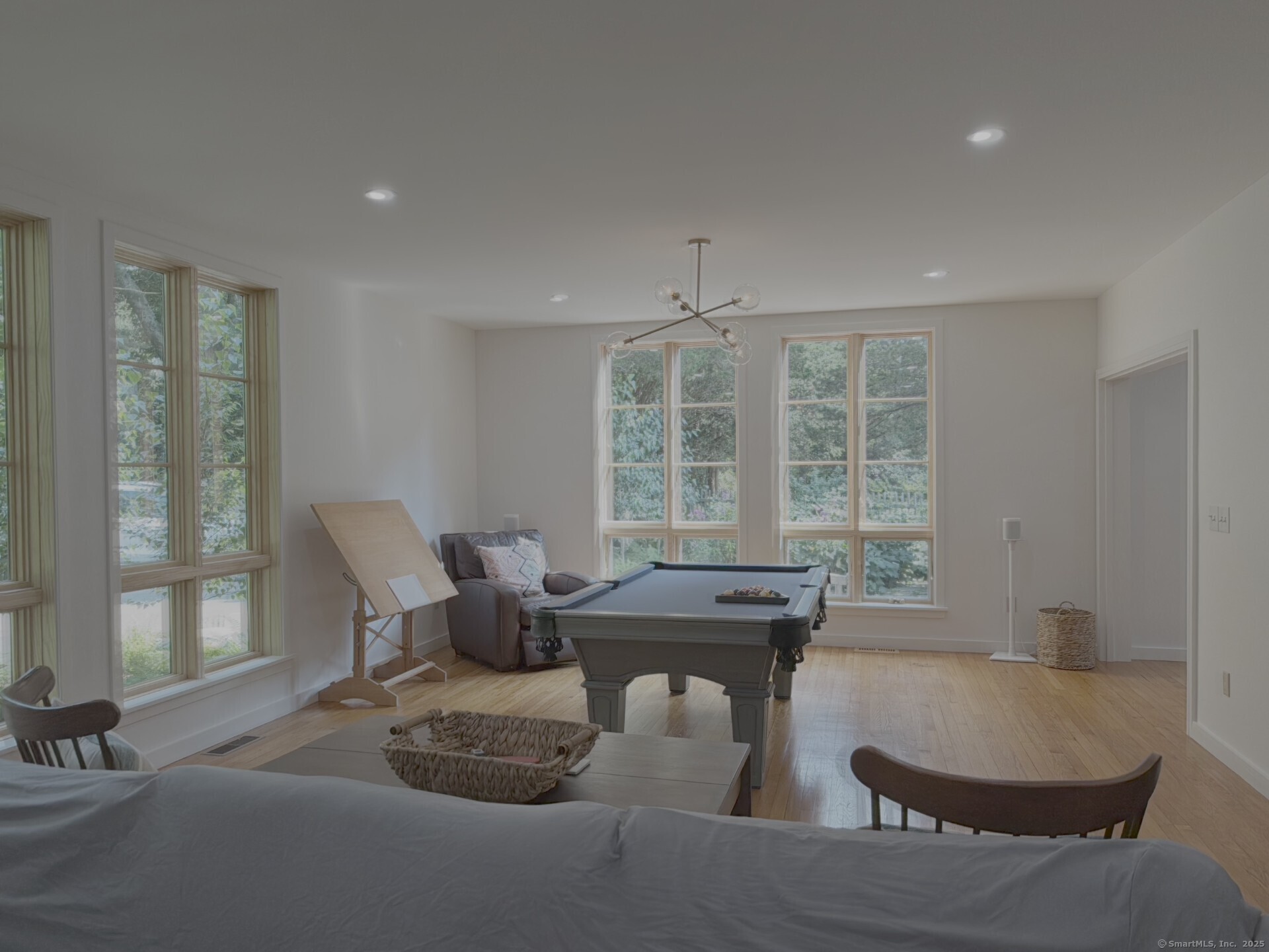 56 Island Avenue Madison, CT 06443 - Photo 5 of 25 a dining room with furniture and large windows