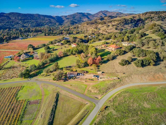 a view of a swimming pool with a yard