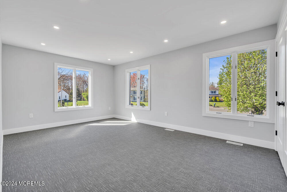 17 Spicy Pond Road Howell, NJ 07731 - Photo 21 of 44 an empty room with windows
