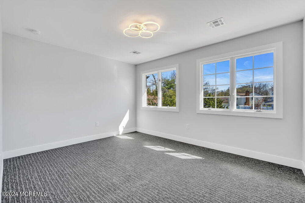 17 Spicy Pond Road Howell, NJ 07731 - Photo 28 of 44 a view of an empty room with a window