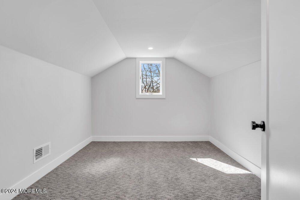 17 Spicy Pond Road Howell, NJ 07731 - Photo 34 of 44 an empty room with a window