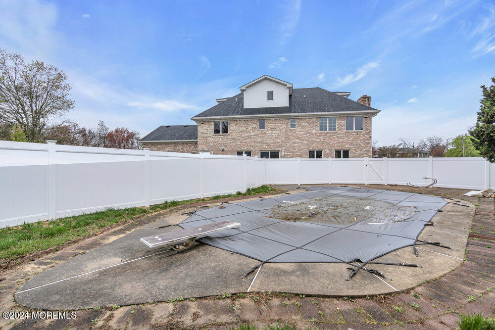 17 Spicy Pond Road Howell, NJ 07731 - Photo 41 of 44 a front view of a house with a yard