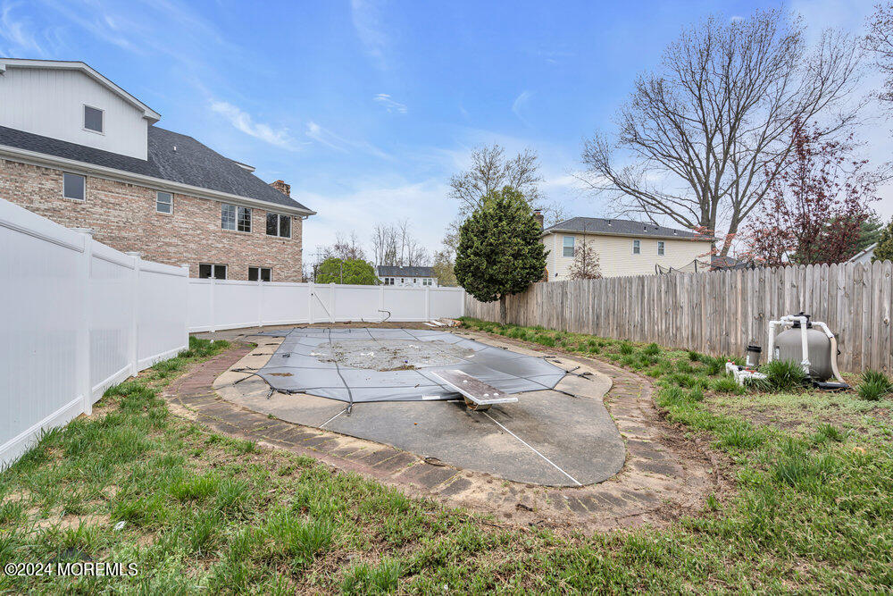 17 Spicy Pond Road Howell, NJ 07731 - Photo 42 of 44 a backyard of a house with lots of green space