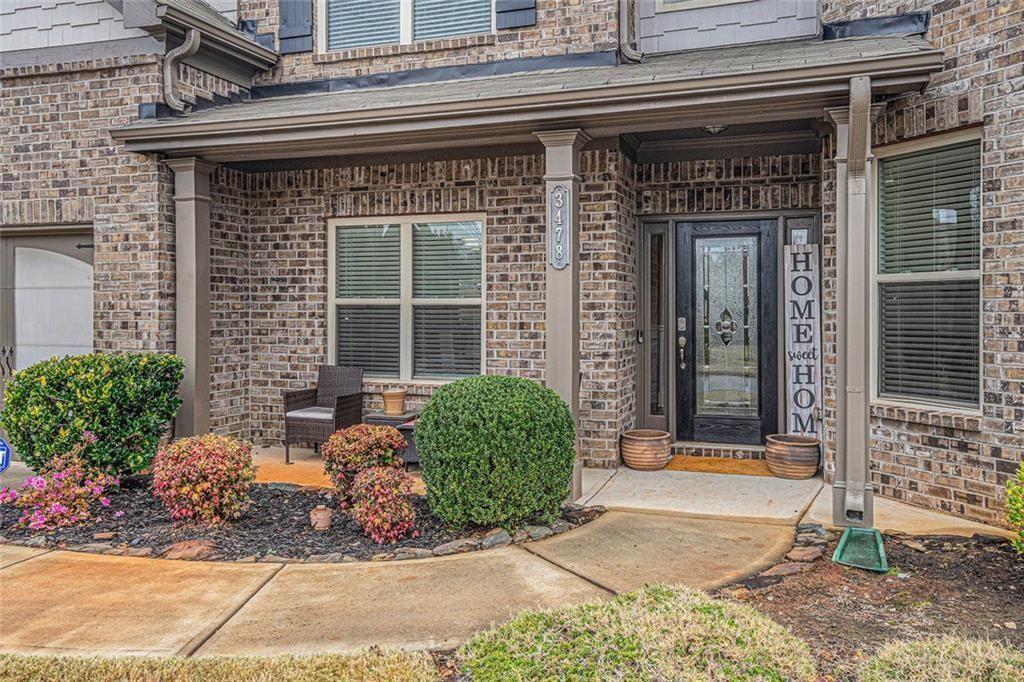 3478 In Bloom Way Auburn, GA 30011 - Photo 3 of 32 a front view of a house
