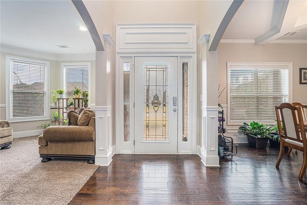 3478 In Bloom Way Auburn, GA 30011 - Photo 4 of 32 a living room with furniture and a large window