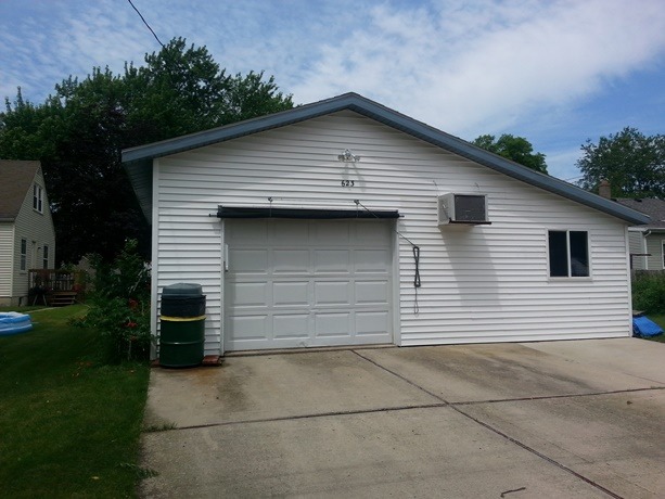 623 North 14th Street Rochelle, IL 61068 - Photo 3 of 4 a view of garage yard and garage