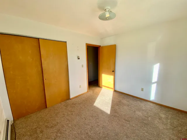 a view of livingroom with kitchen