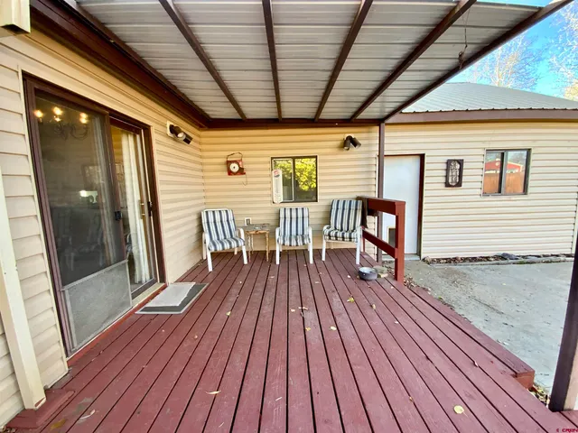 a view of a deck with wooden floor