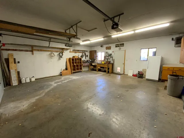a view of a garage with storage