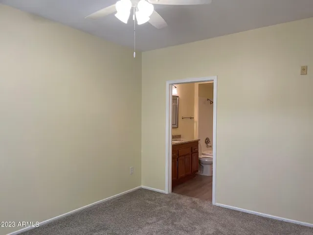 an empty room with a bathroom