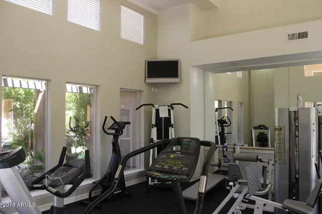 a view of a room with gym equipment