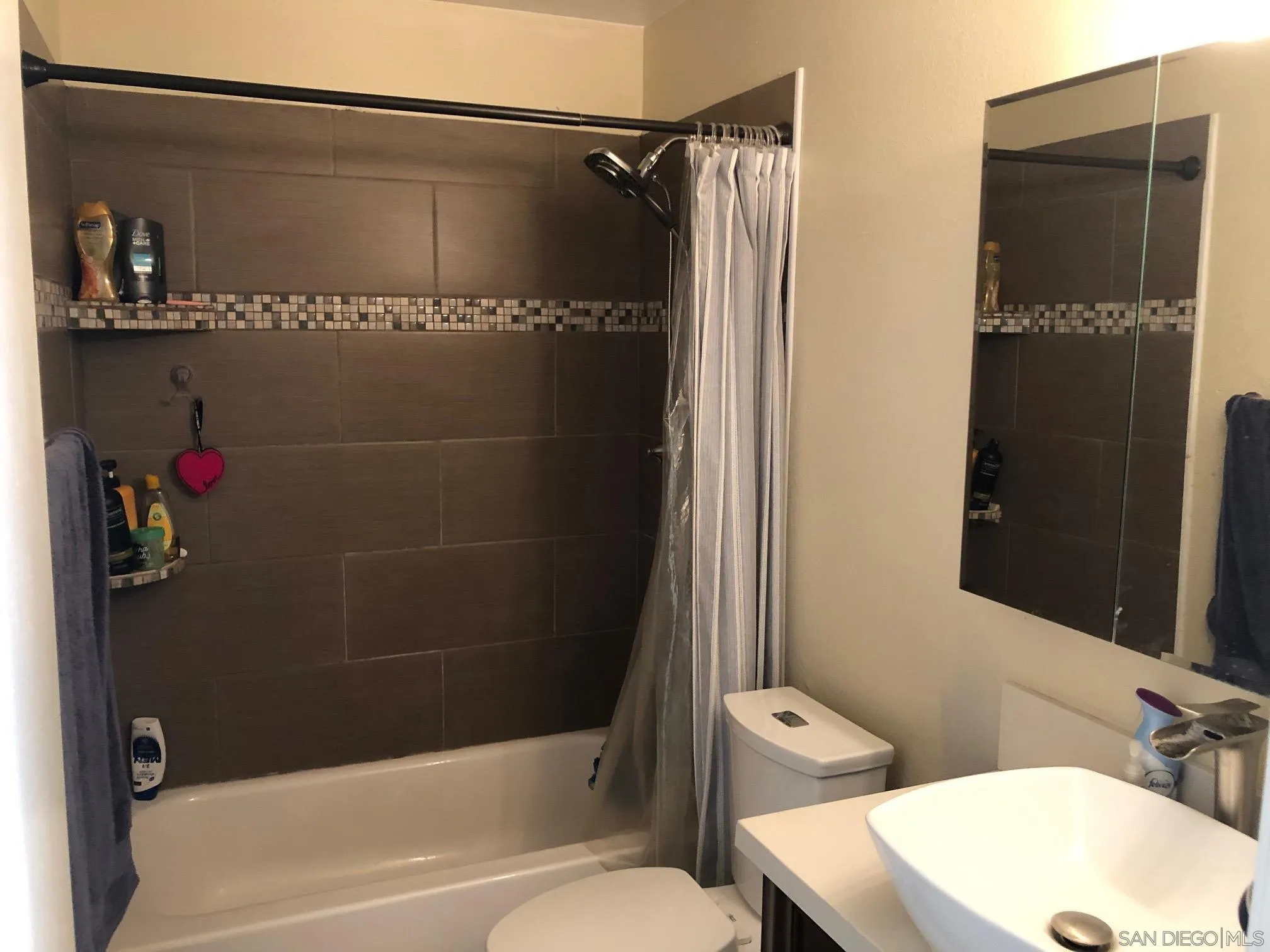 1935 Terracina Circle Spring Valley, CA 91977 - Photo 4 of 5 a bathroom with a bathtub and a shower