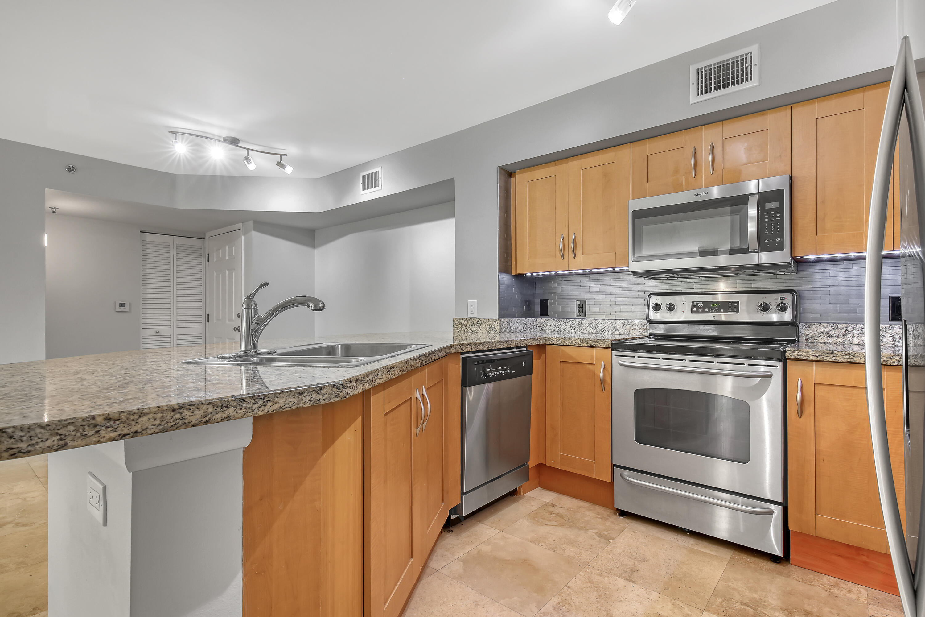 3133 Clint Moore Road, Unit 104 Boca Raton, FL 33496 - Photo 1 of 48 KITCHEN