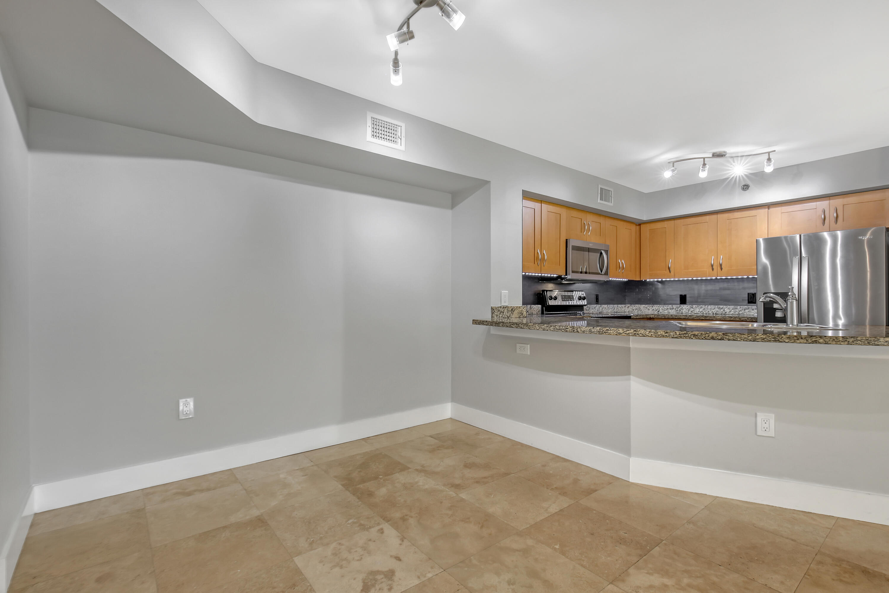 3133 Clint Moore Road, Unit 104 Boca Raton, FL 33496 - Photo 5 of 48 DINING ROOM, KITCHEN