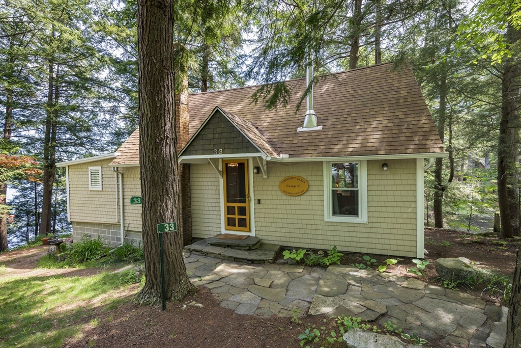 33 Farmhouse Road Chesterfield, MA 01012 - Photo 3 of 41 a front view of a house with a yard