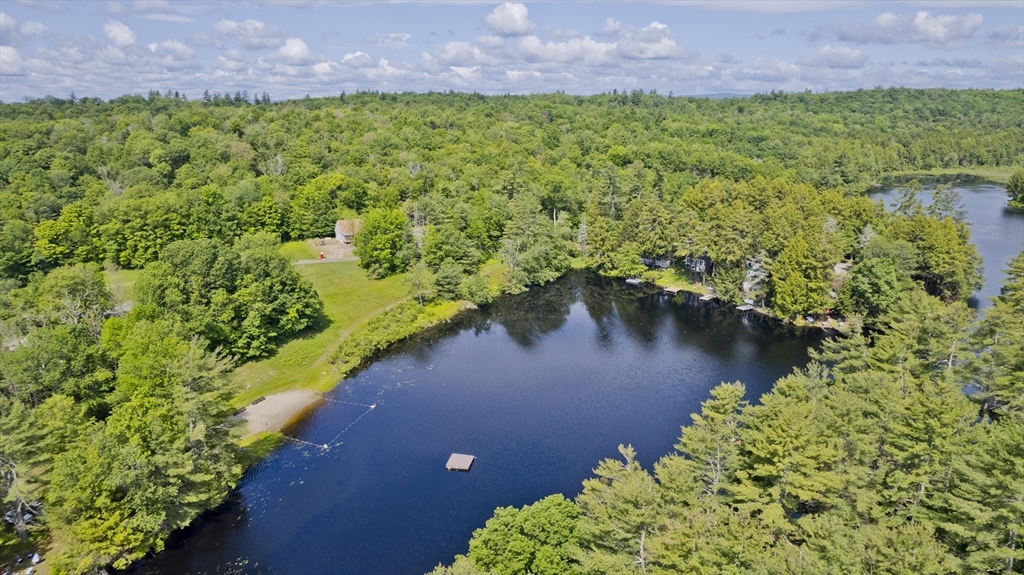 33 Farmhouse Road Chesterfield, MA 01012 - Photo 38 of 41 a view of a lake with a yard