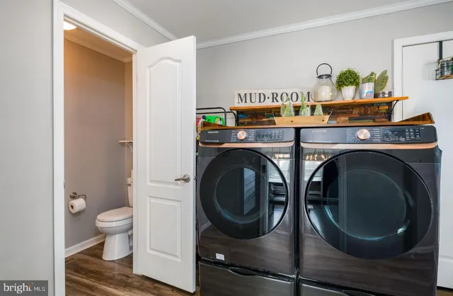 a utility room with dryer and washer