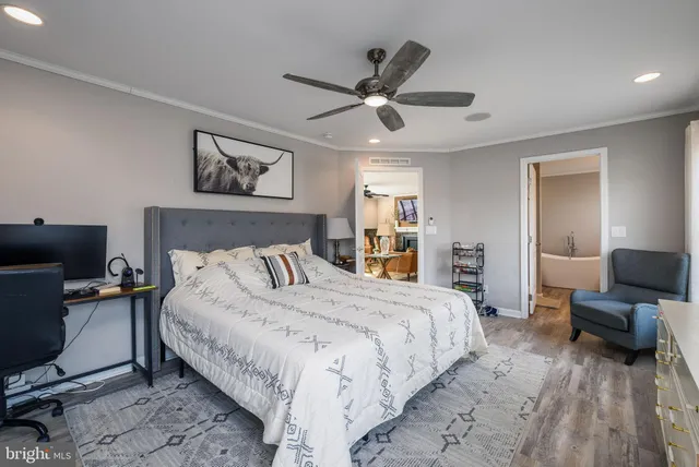 a bedroom with a bed and furniture