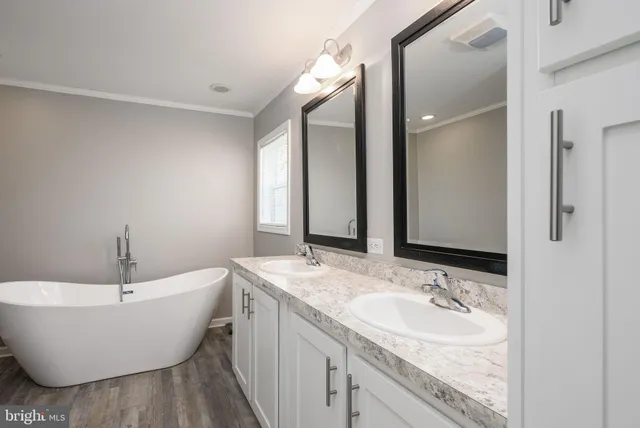 a bathroom with a bathtub and sink