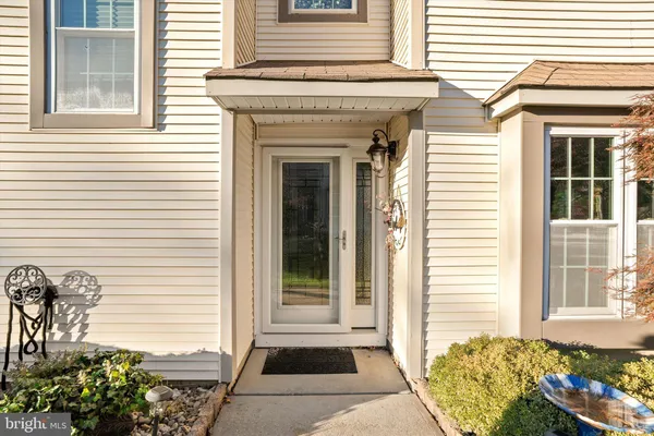 a front view of a house with a porch