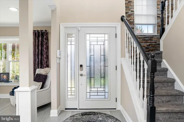 a view of an entryway with staircase