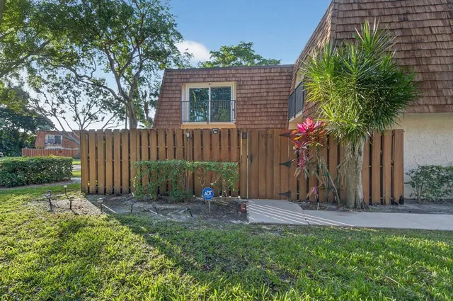 a view of a backyard with a garden