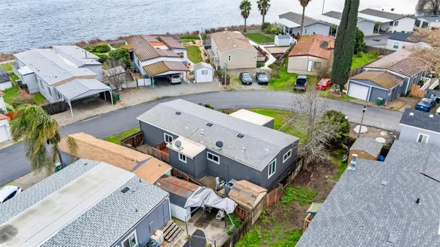 an aerial view of a house with a garden