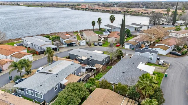 an aerial view of a house with outdoor space