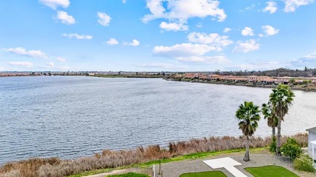 a view of a lake and mountain in the back