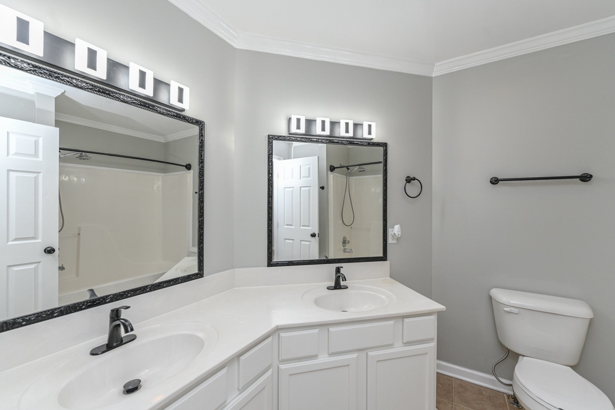 606 Cook Road Portland, TN 37148 - Photo 12 of 17 a bathroom with a toilet sink and mirror