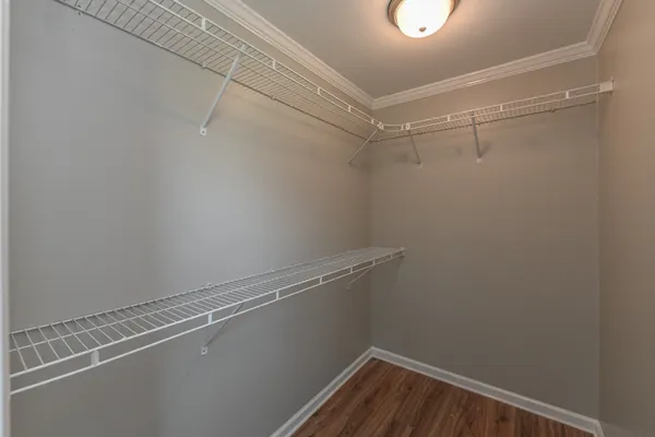 a view of a room with racks on the wall