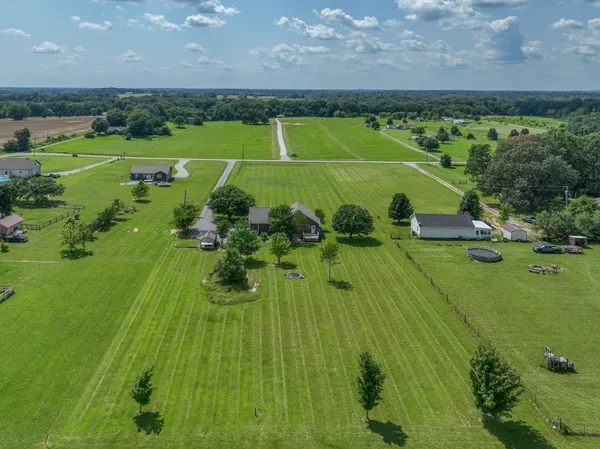 an aerial view of a golf course with a garden