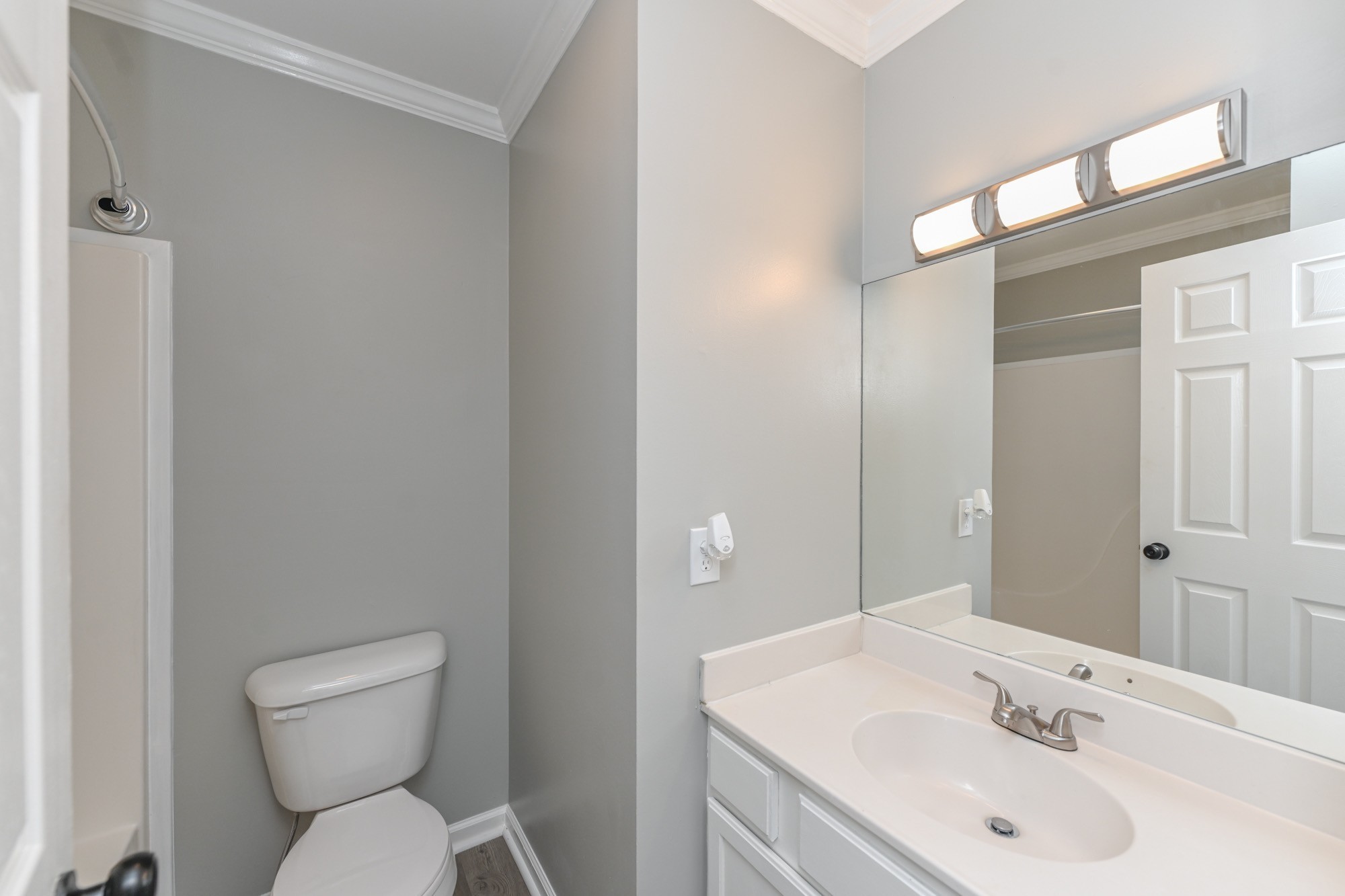 606 Cook Road Portland, TN 37148 - Photo 4 of 17 a bathroom with a sink toilet and a mirror