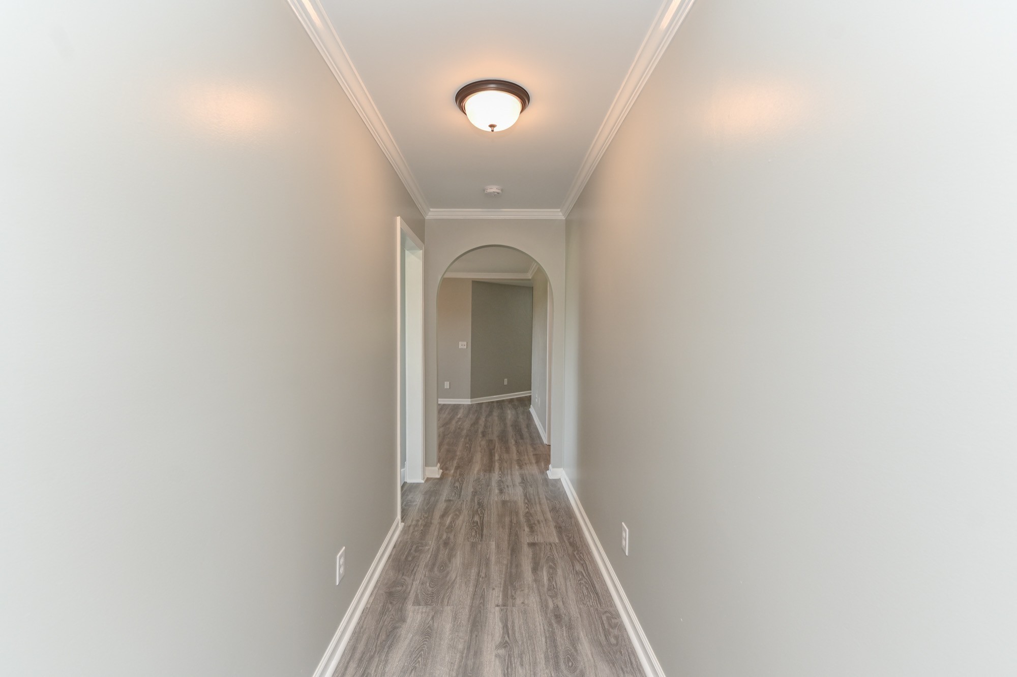606 Cook Road Portland, TN 37148 - Photo 6 of 17 a view of a room with wooden floor and white walls