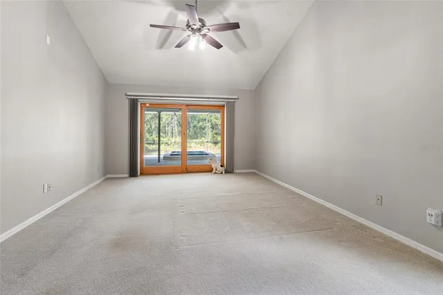 a spacious bathroom with a bathtub sink and mirror