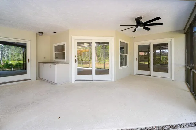 a view of house with backyard