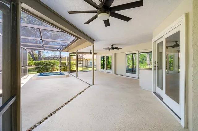 a view of backyard with a garden and entertaining space