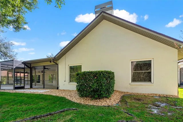 view of a kitchen with refrigerator and stove