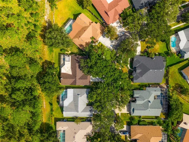 a view of a park with swings and slides
