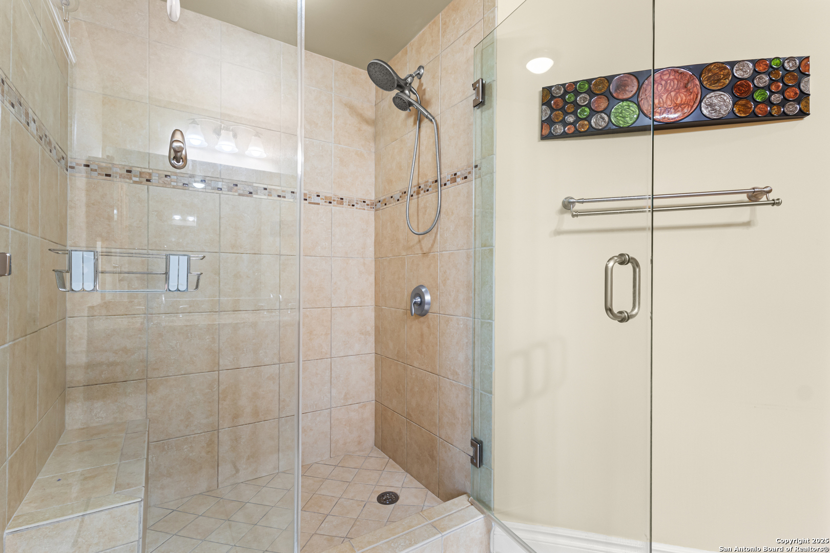215 Center Street, Unit 1005 San Antonio, TX 78202 - Photo 12 of 29 a bathroom with a shower