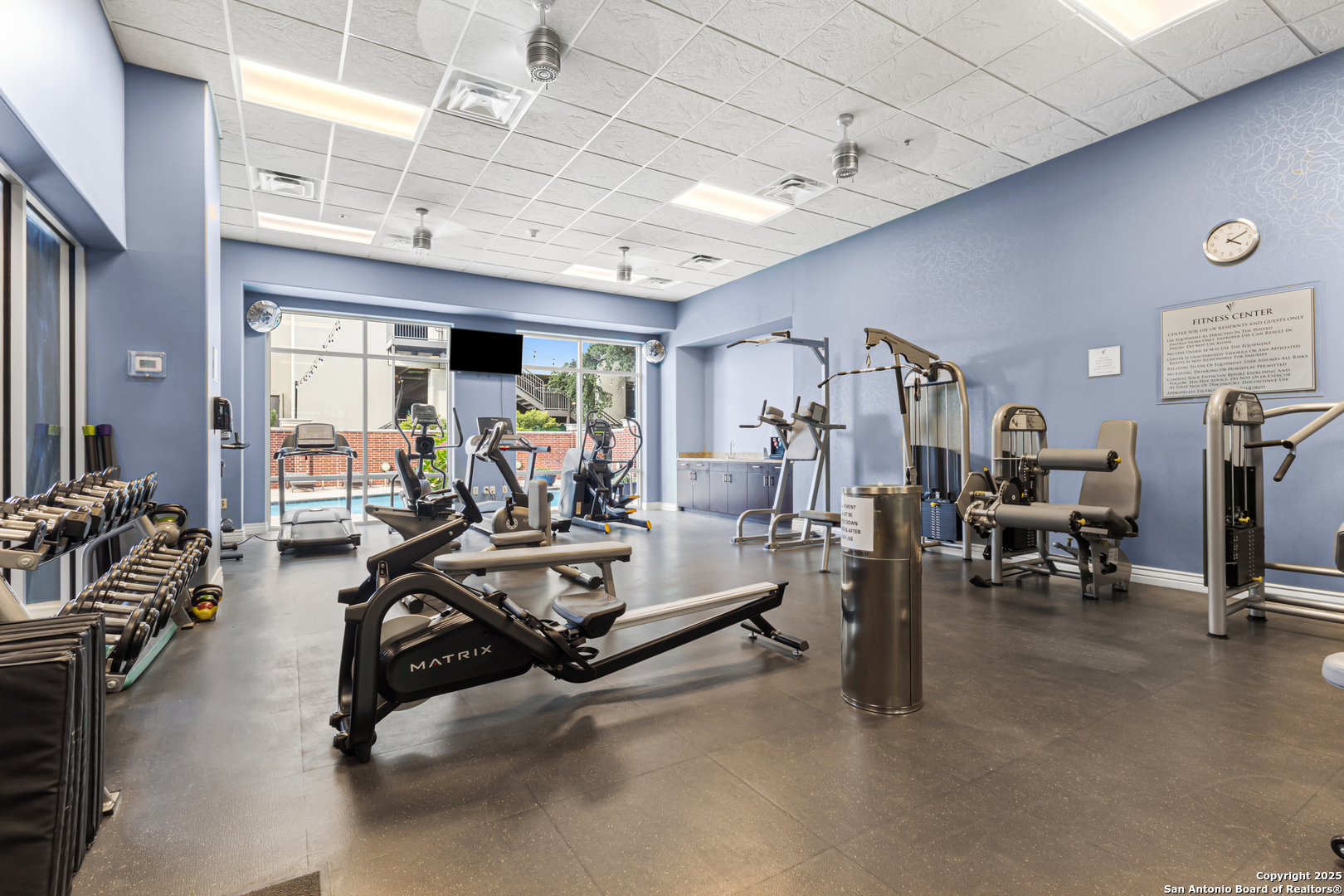 215 Center Street, Unit 1005 San Antonio, TX 78202 - Photo 24 of 29 a view of a room with gym equipment