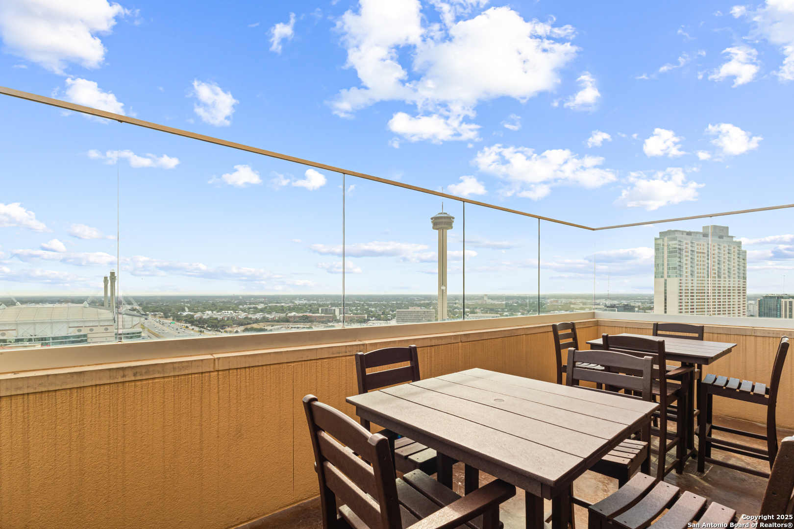 215 Center Street, Unit 1005 San Antonio, TX 78202 - Photo 27 of 29 a view of a terrace with furniture and stove
