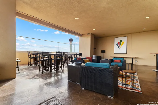 a living room with lots of furniture and lots of furniture