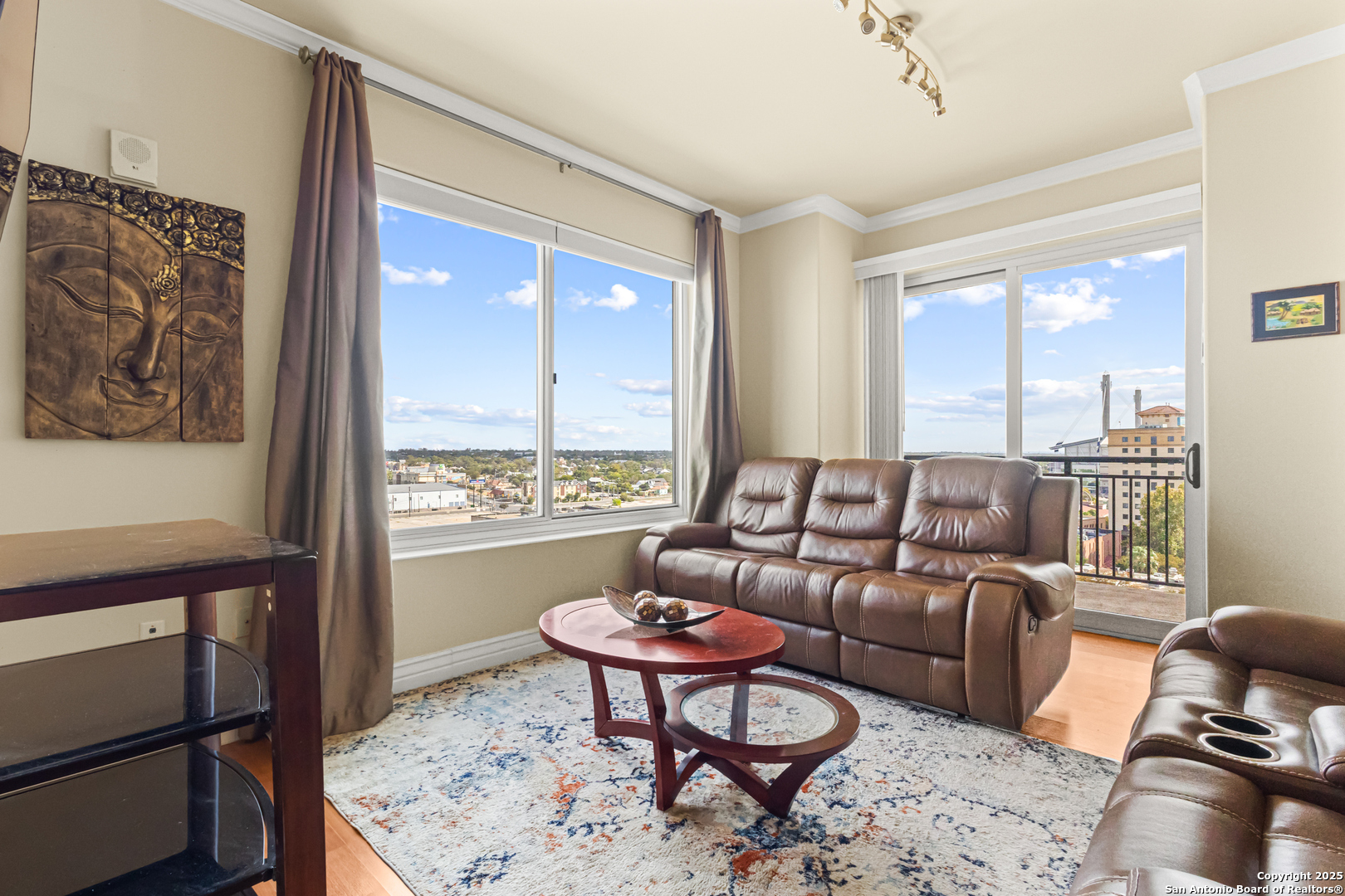 215 Center Street, Unit 1005 San Antonio, TX 78202 - Photo 7 of 29 a living room with furniture and a window
