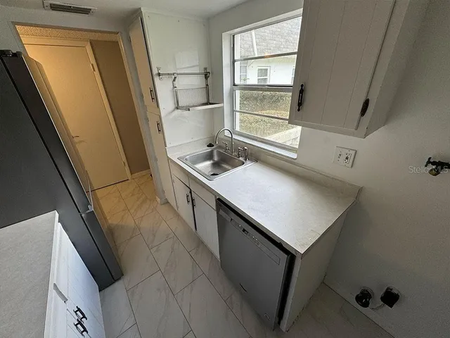 a bathroom with a sink and a toilet