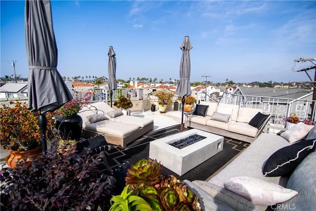 a bed room with furniture and a floor to ceiling window